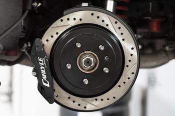 15" Conversion Kit by Carlyle Racing, Drilled and Slotted Rotors, Black Calipers BMR Suspension لـ Chevy Camaro 2016-2024