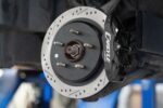 15" Conversion Kit by Carlyle Racing, Drilled and Slotted Rotors, Black Calipers BMR Suspension لـ Corvette 1997-2004