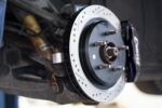15" Conversion Kit by Carlyle Racing, Drilled and Slotted Rotors, Black Calipers BMR Suspension لـ Corvette 1997-2004