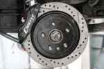 15" Conversion Kit by Carlyle Racing, Drilled and Slotted Rotors, Black Calipers BMR Suspension for Cadillac CTS-V 2008-2014