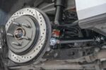 15" Conversion Kit by Carlyle Racing, Drilled and Slotted Rotors, Black Calipers BMR Suspension for Cadillac CTS-V 2015-2019