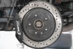 15" Conversion Kit by Carlyle Racing, Drilled and Slotted Rotors, Black Calipers BMR Suspension for Cadillac CTS-V 2015-2019