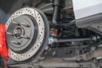 15" Conversion Kit by Carlyle Racing, Drilled and Slotted Rotors, Red Calipers BMR Suspension for Cadillac CTS-V 2015-2019